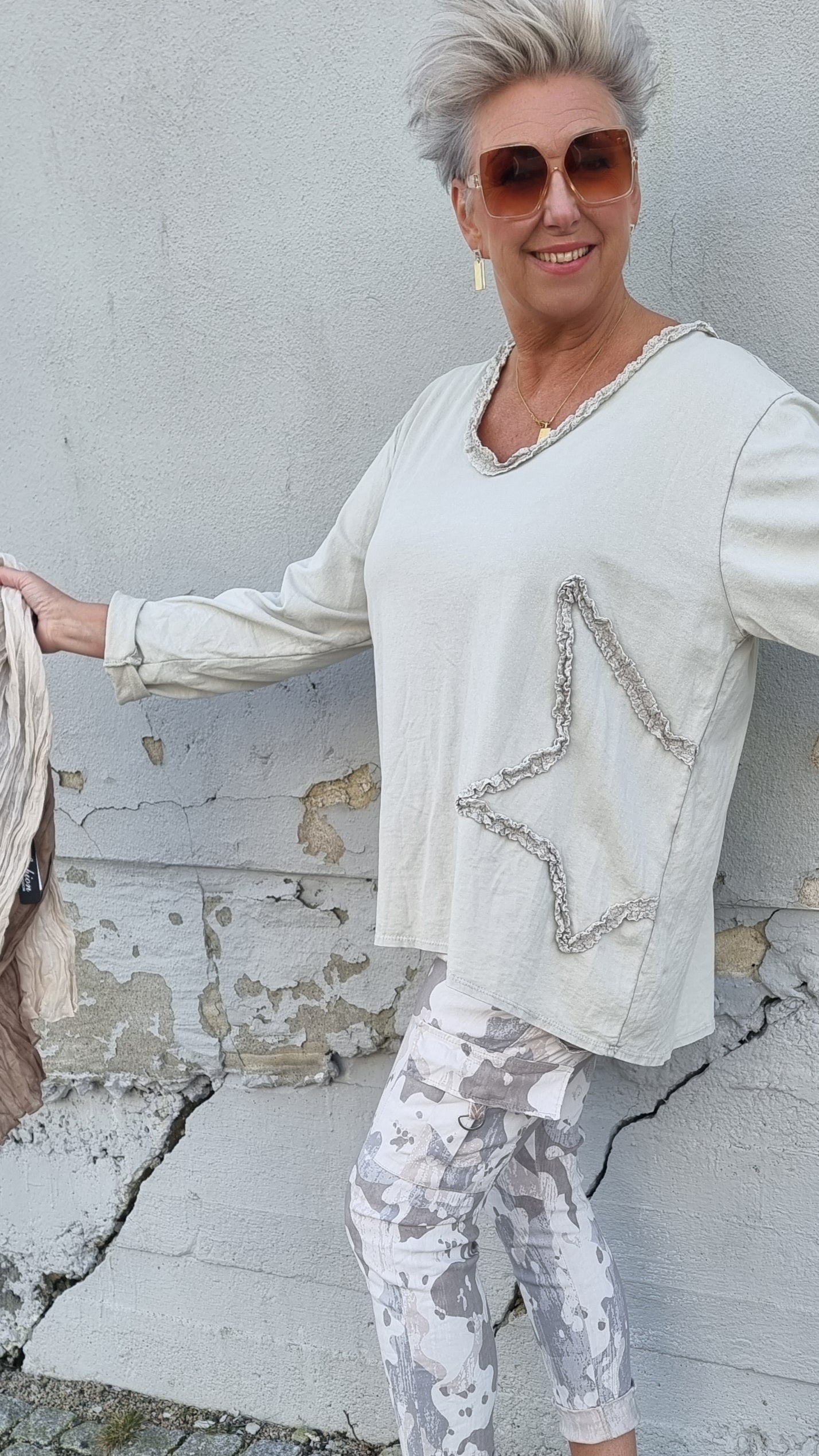 Beige topp med stjerne
