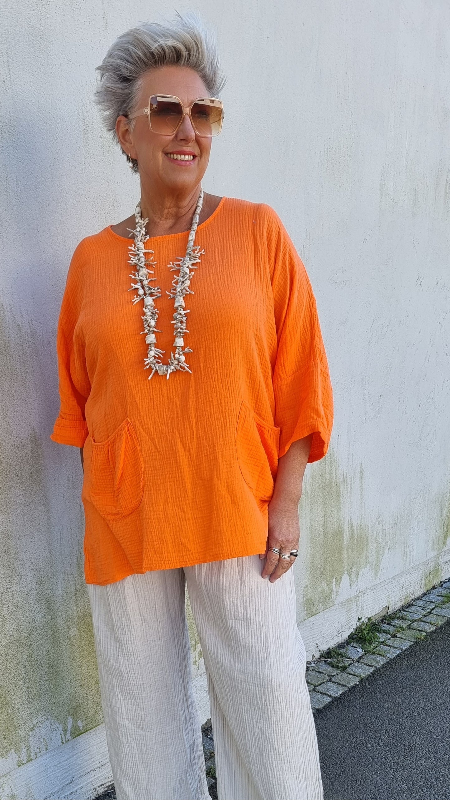 Ina vaffled topp med lommer orange