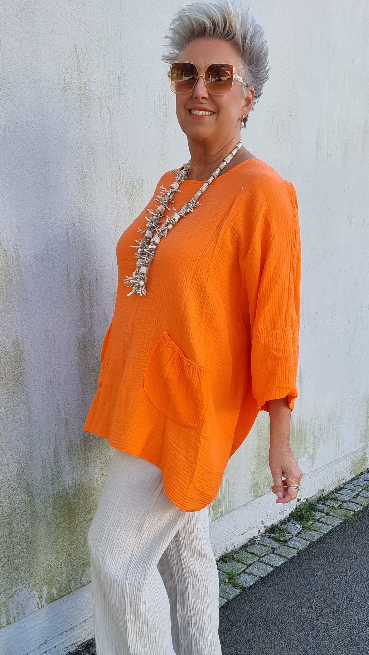 Ina vaffled topp med lommer orange