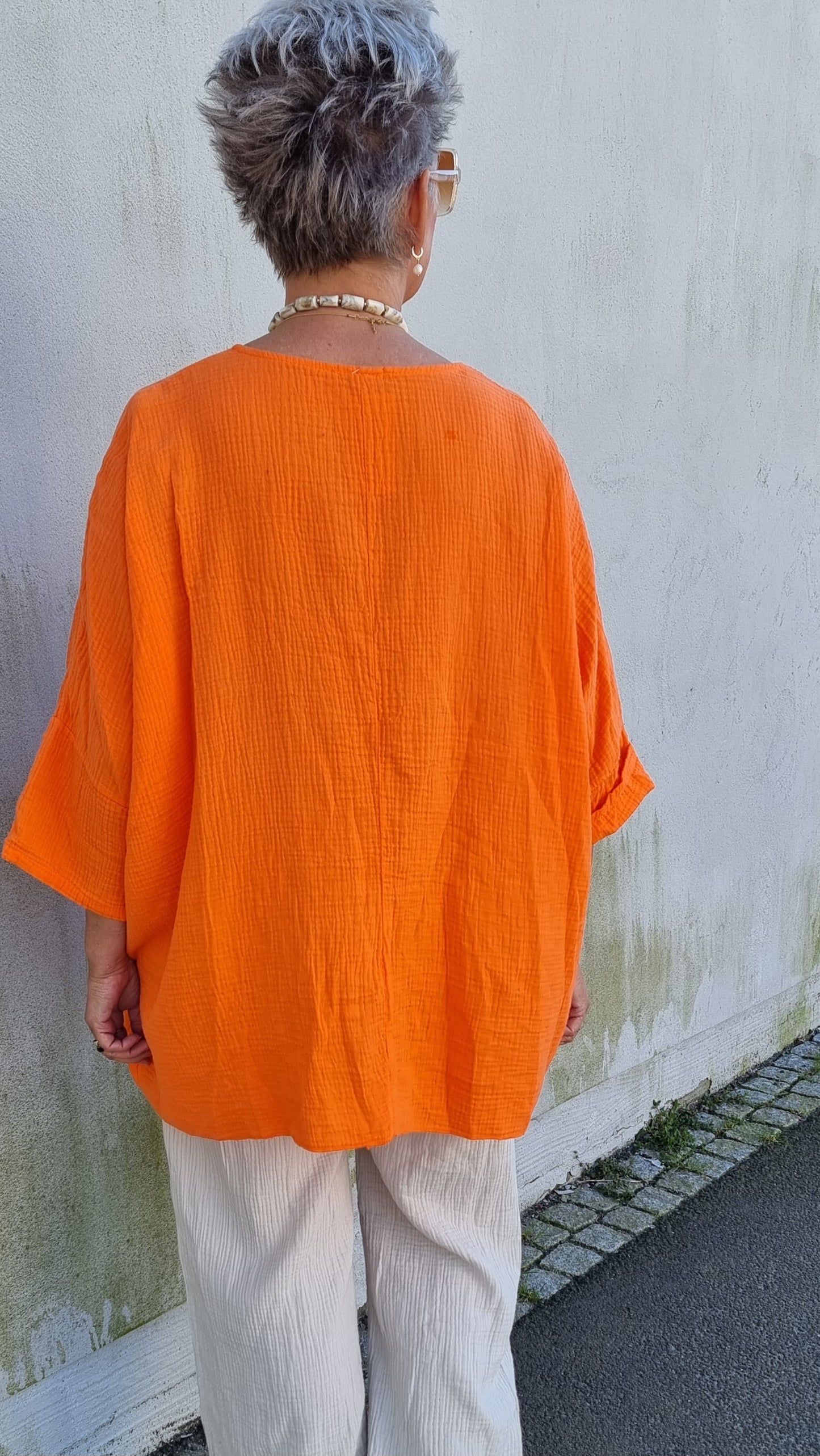 Ina vaffled topp med lommer orange