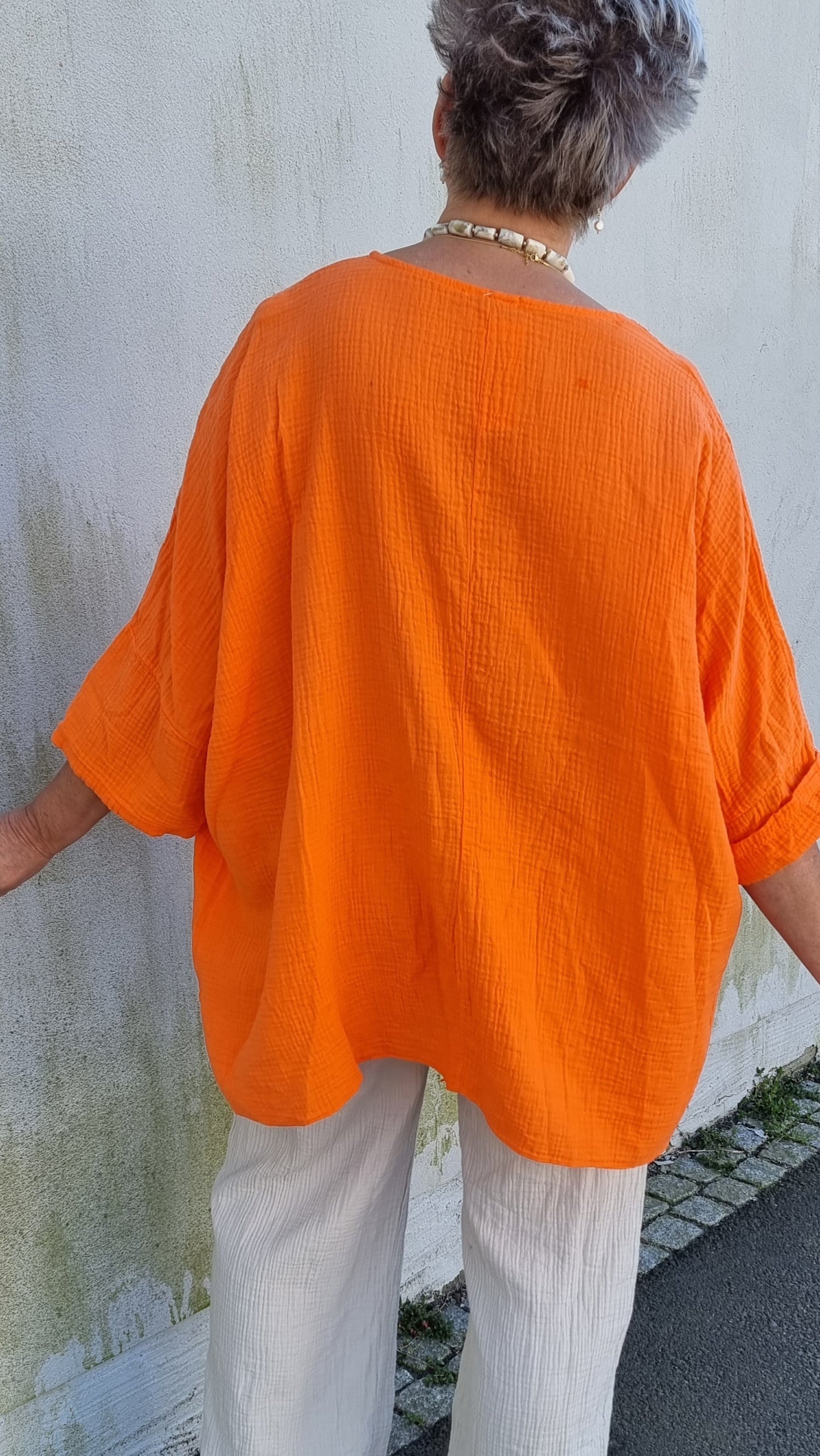 Ina vaffled topp med lommer orange