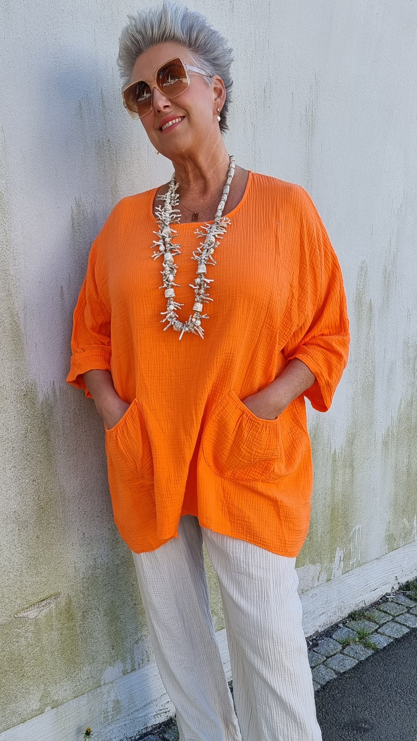Ina vaffled topp med lommer orange