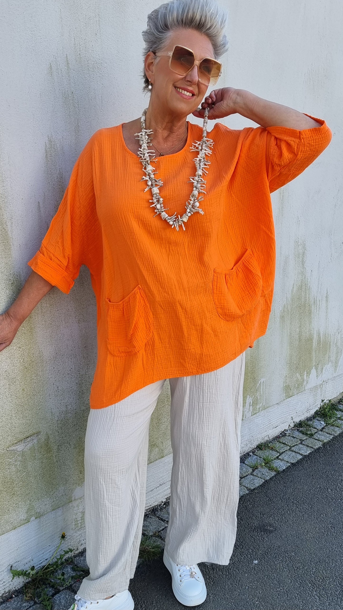 Ina vaffled topp med lommer orange