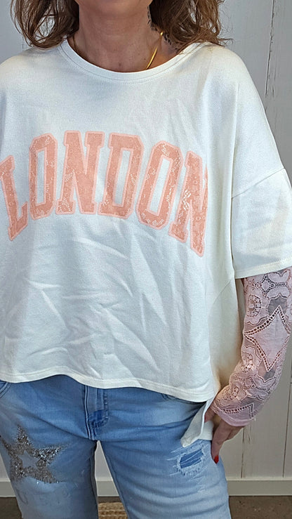 Birka oversized topp hvit/rosa