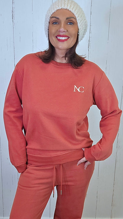 Caroline Joggesett orangerød