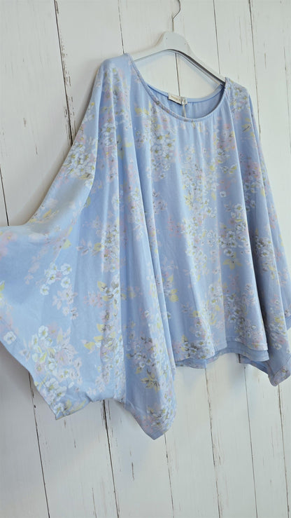 Blomstret poncho-topp blå