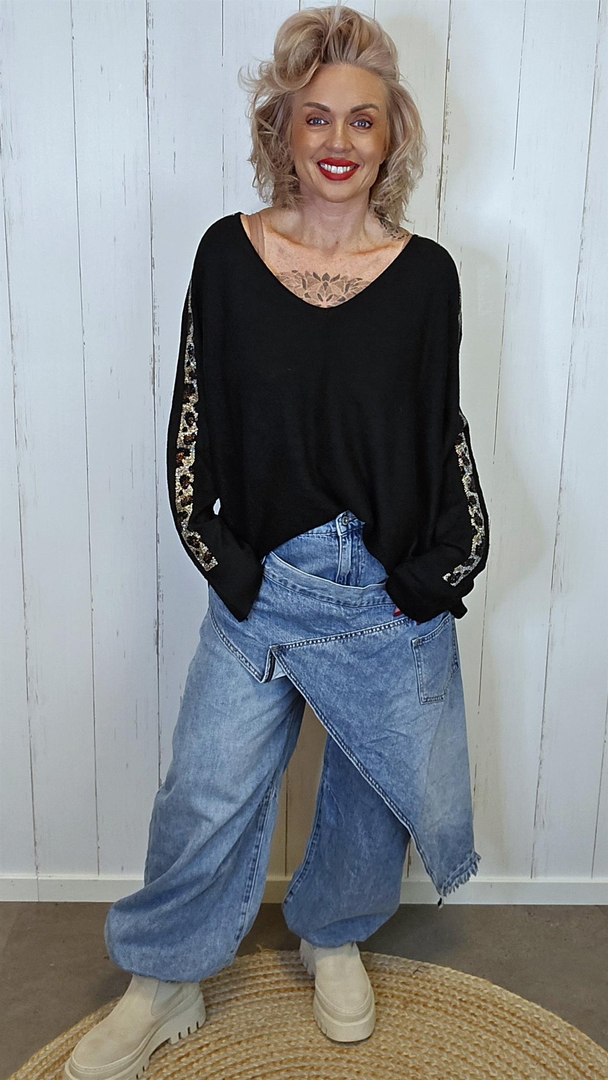 Evelina Genser svart