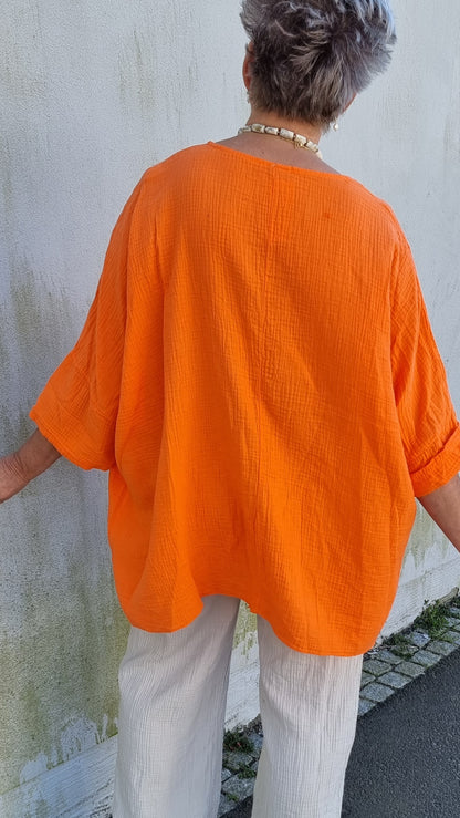 Ina vaffled topp med lommer orange