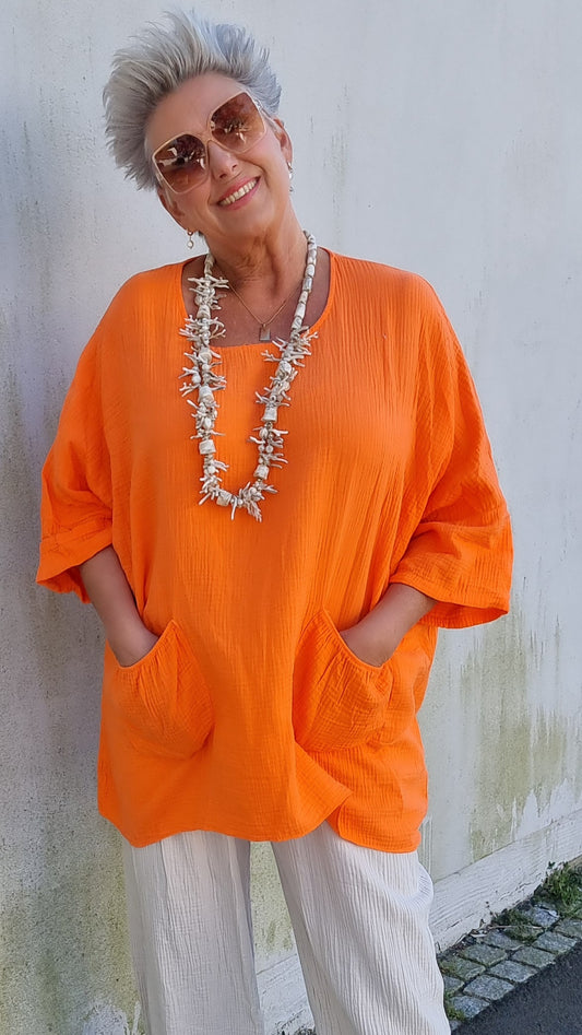 Ina vaffled topp med lommer orange