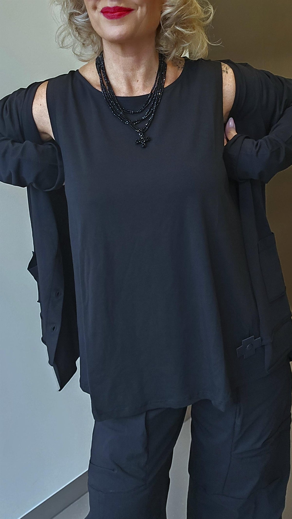 A top svart