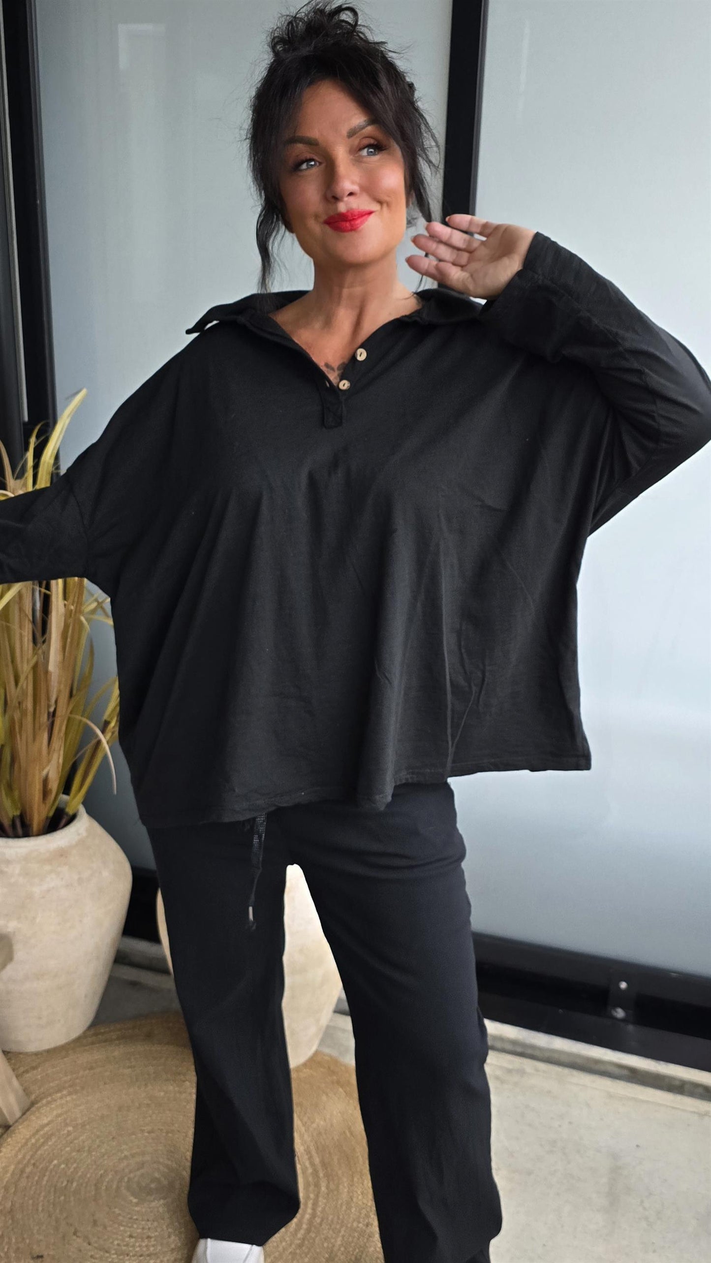 Bianco topp med knapper svart