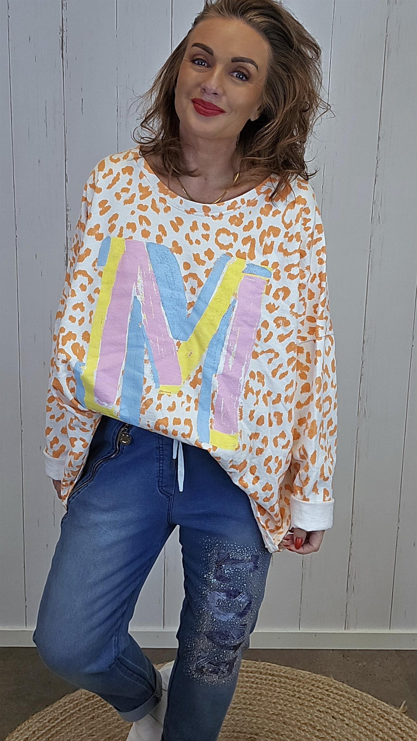 Celine bomullstopp oransje leo