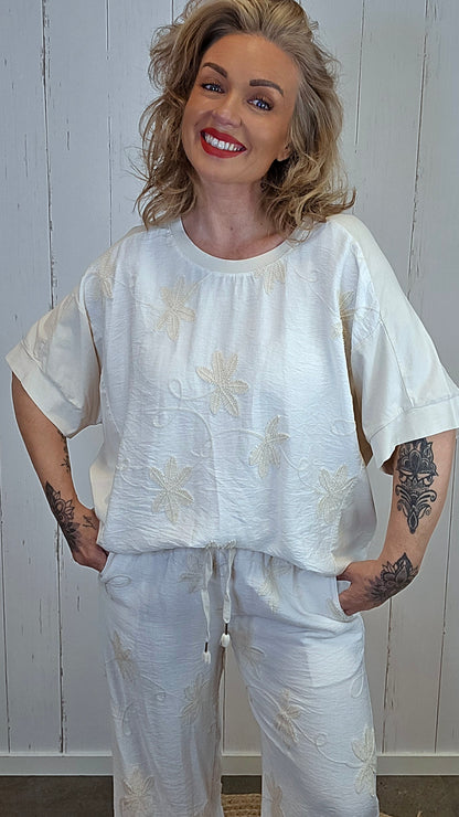 Marian topp med broderte detaljer