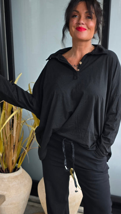 Bianco topp med knapper svart