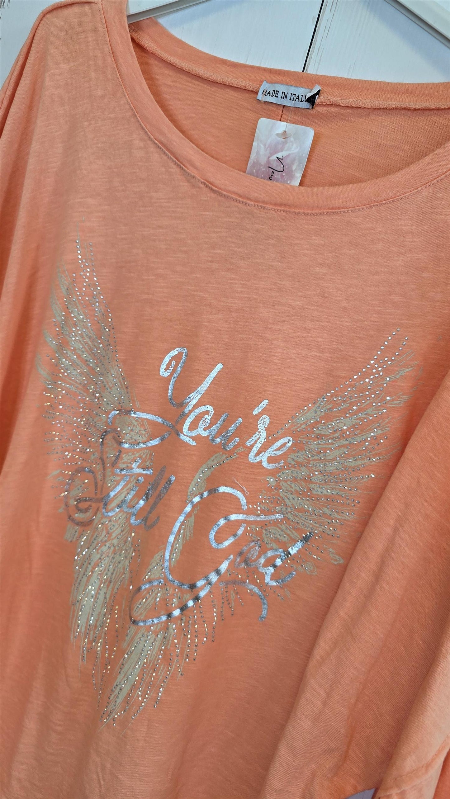Orangefarget topp med glitterprint