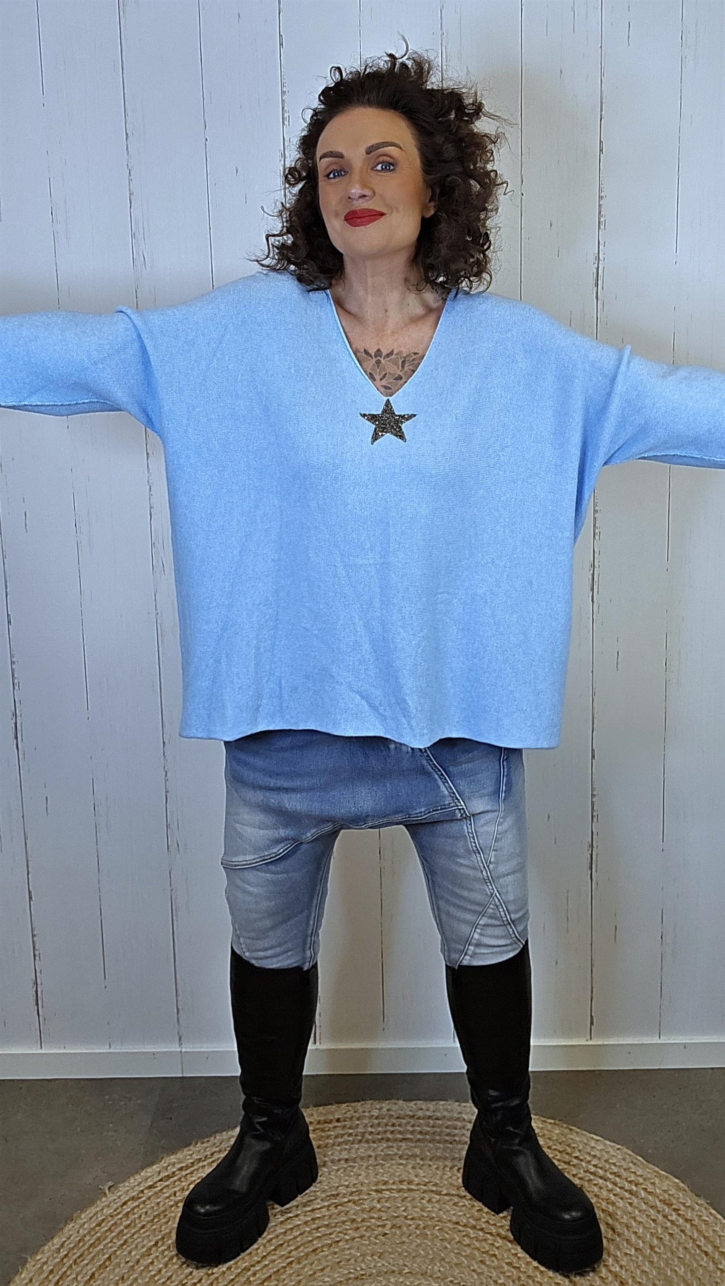 Stella genser med stjerne blå