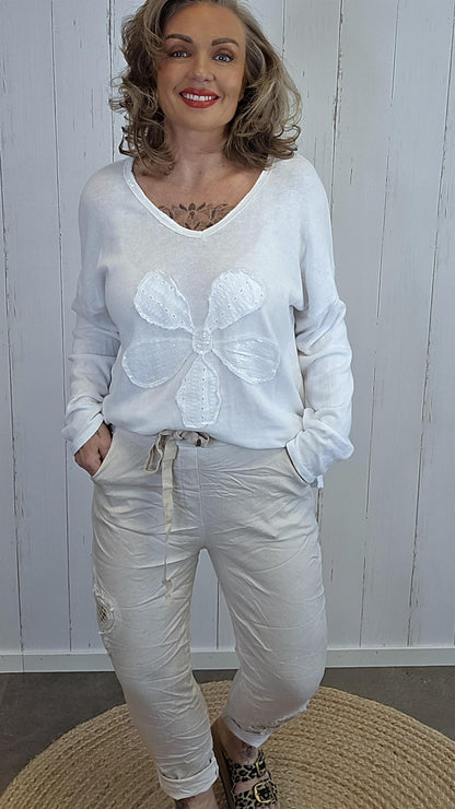 Alma bukse med blomst beige