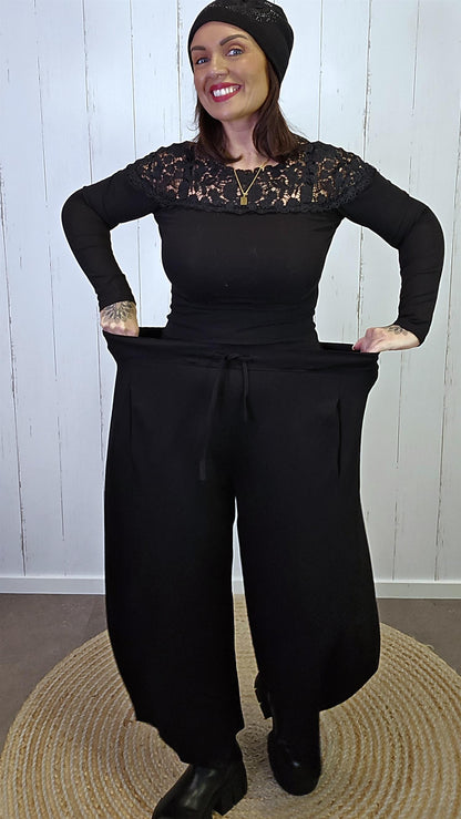 Siv baggybukse svart