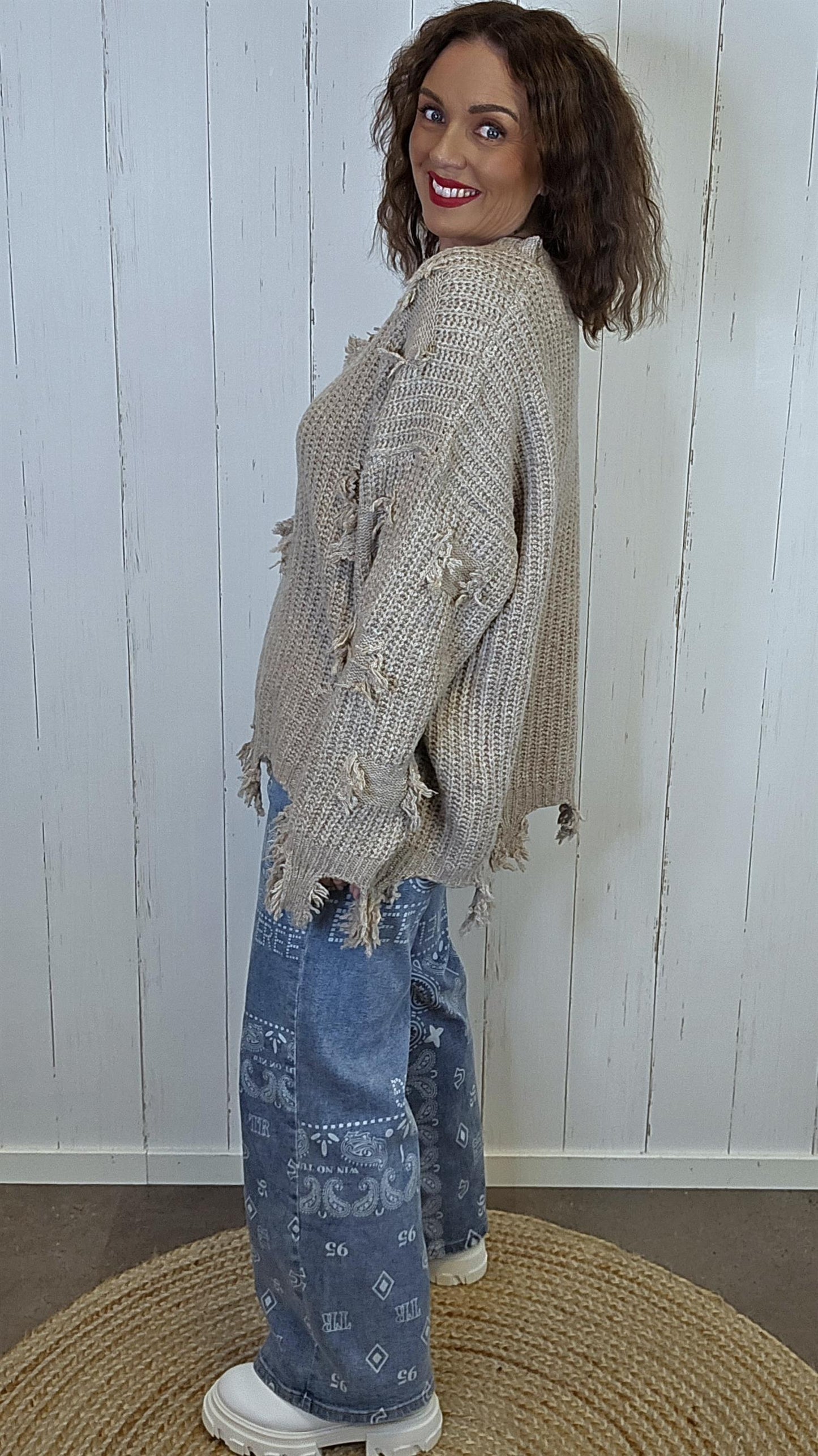 Selma Strikkegenser med rå detaljer