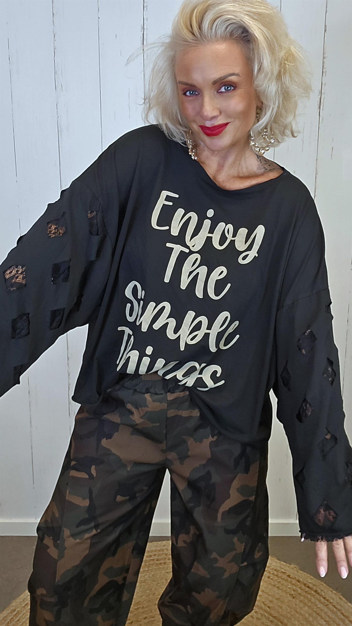 Livia oversized topp med blondeermer svart