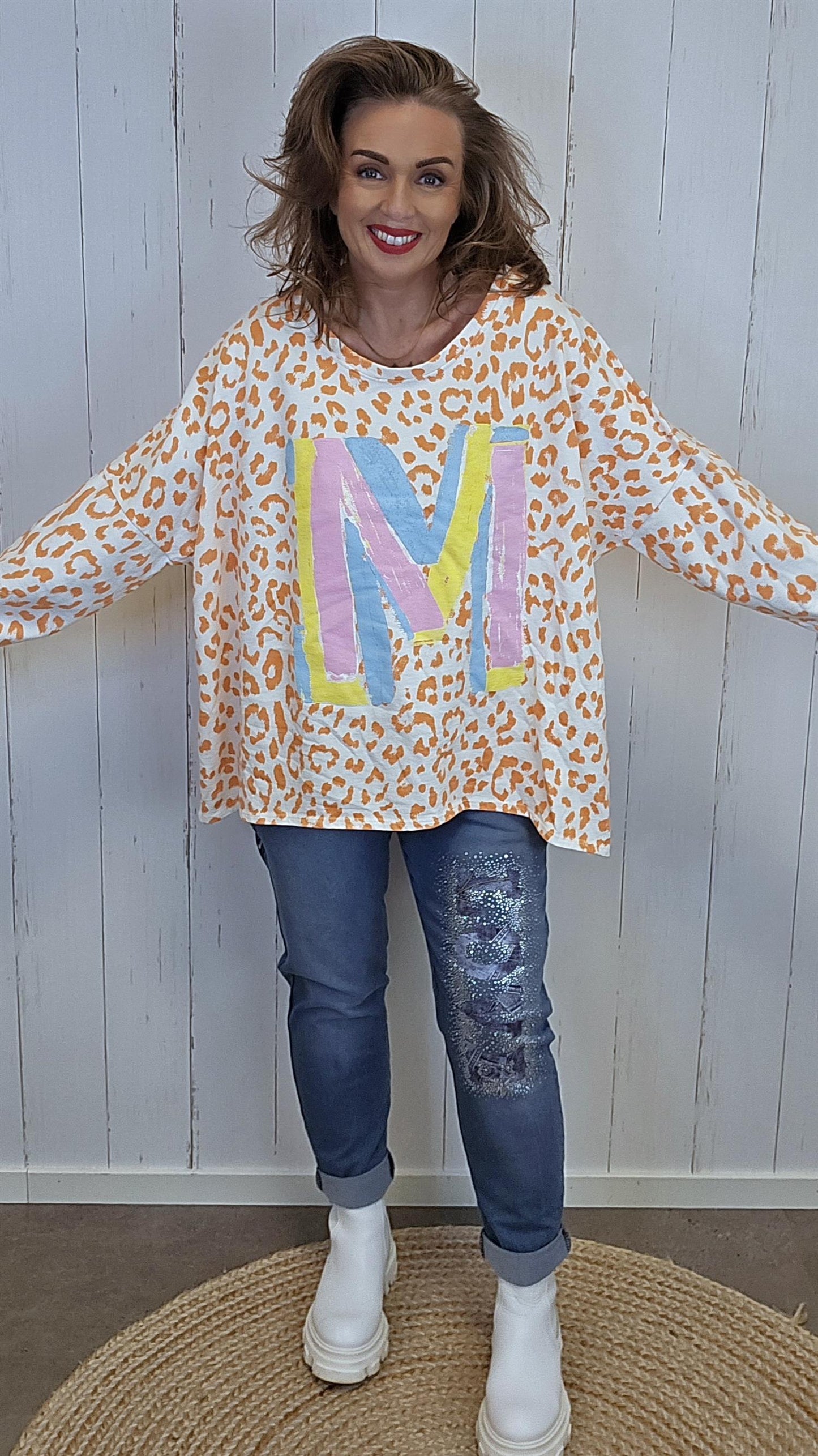 Celine bomullstopp oransje leo