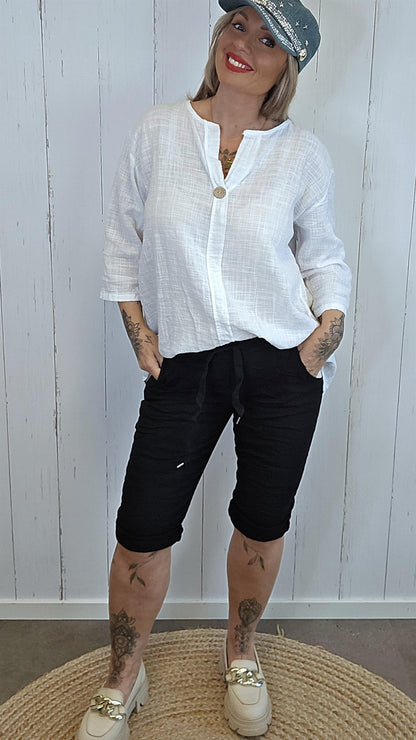 Betty bluse med dekorativ knapp