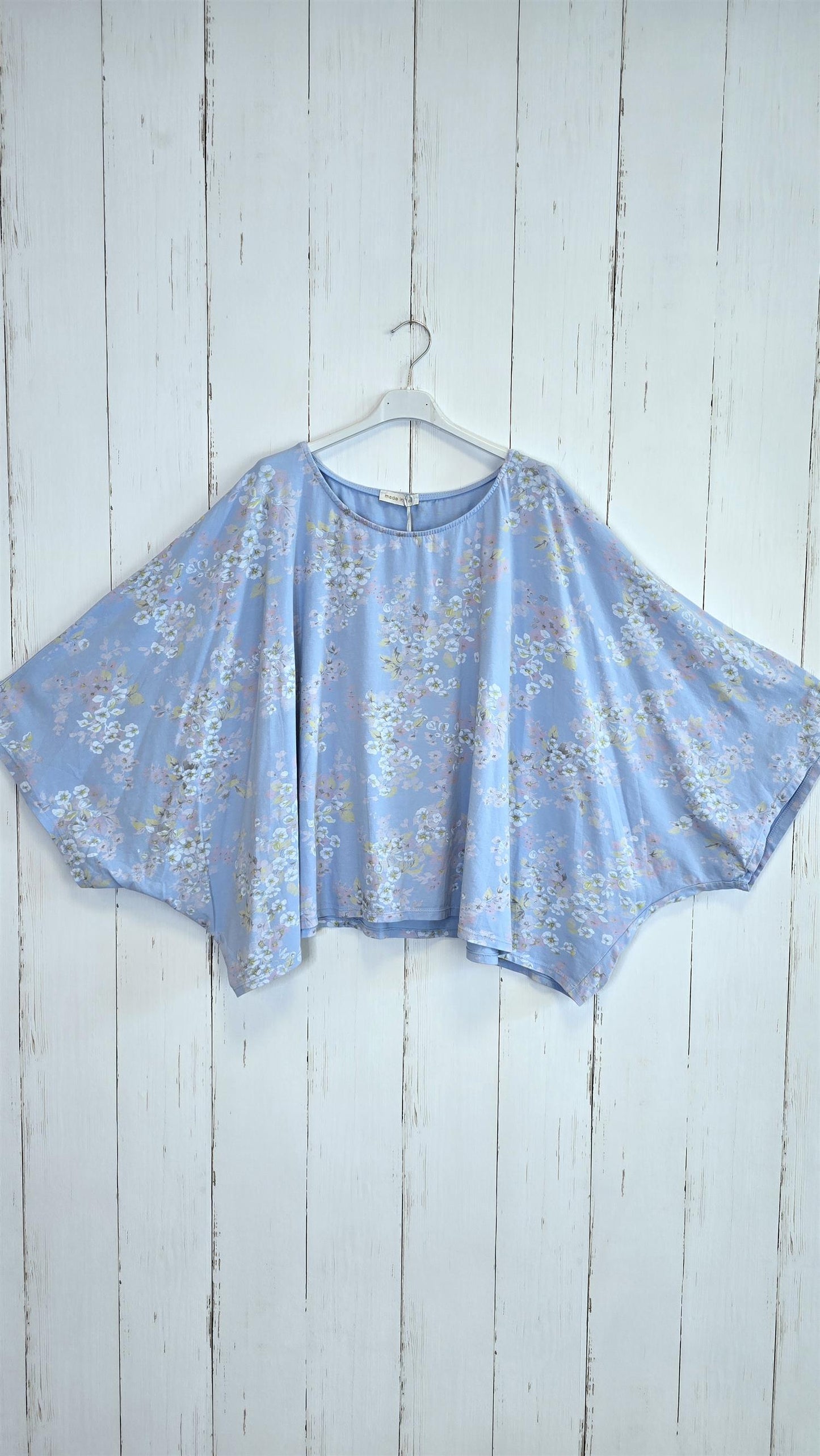 Blomstret poncho-topp blå