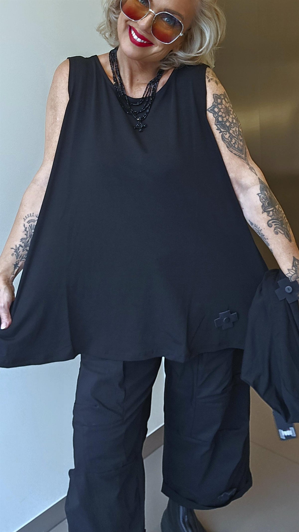 A top svart