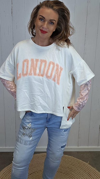 Birka oversized topp hvit/rosa