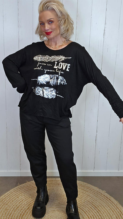 Uma supermyk gensertopp med sølvprint