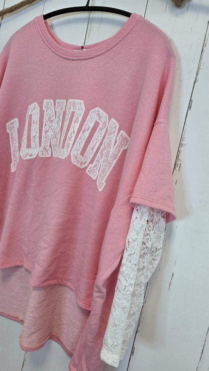 Birka oversized topp rosa/hvit