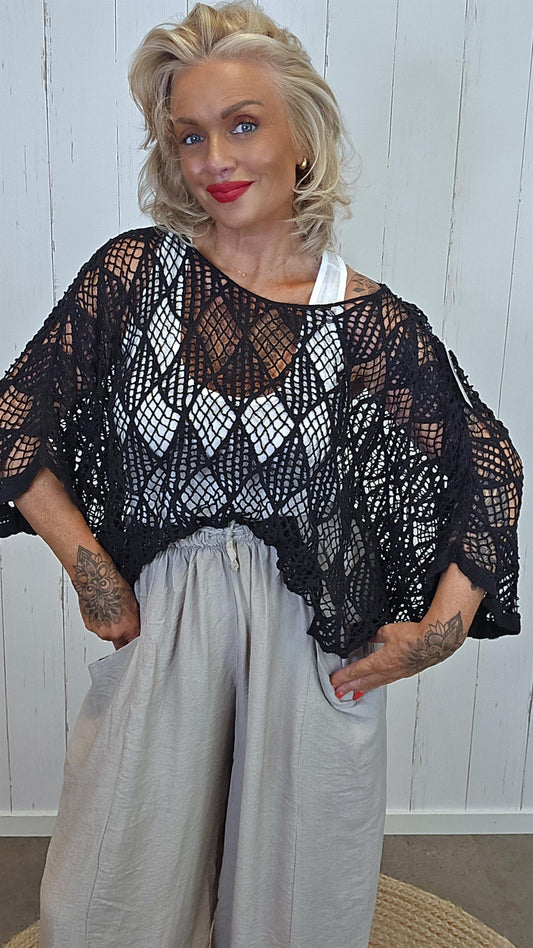 Clara ponchotopp heklet svart