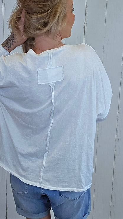 Hvitfarget topp med glitterprint