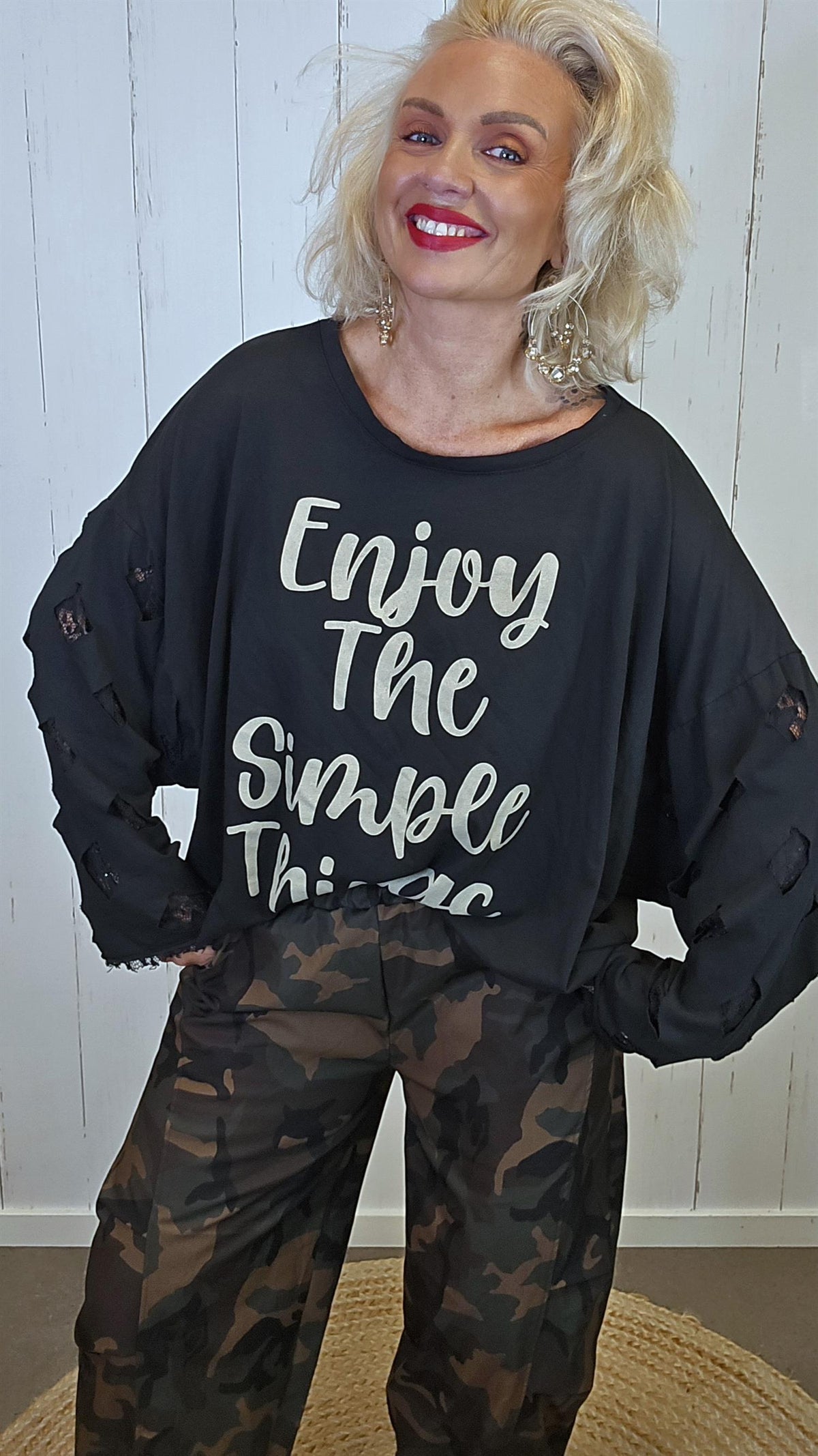 Livia oversized topp med blondeermer svart