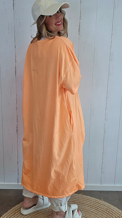 Stine kjole med “Sunset”-print orange