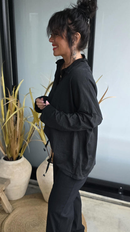 Bianco topp med knapper svart