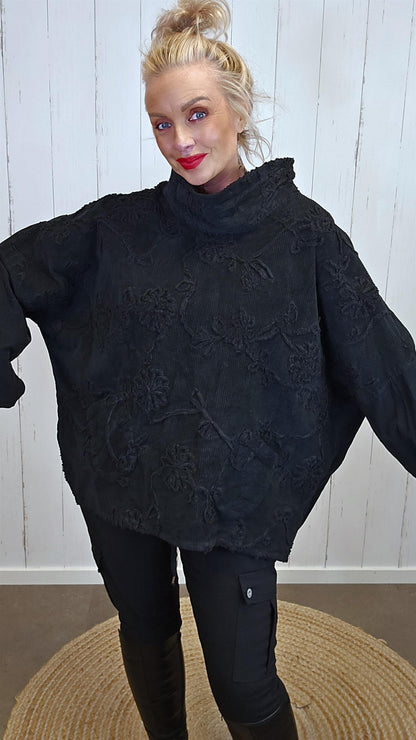 Gia oversized tunikatopp i minikord med broderier