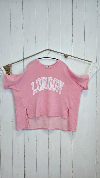 Birka oversized topp rosa/hvit