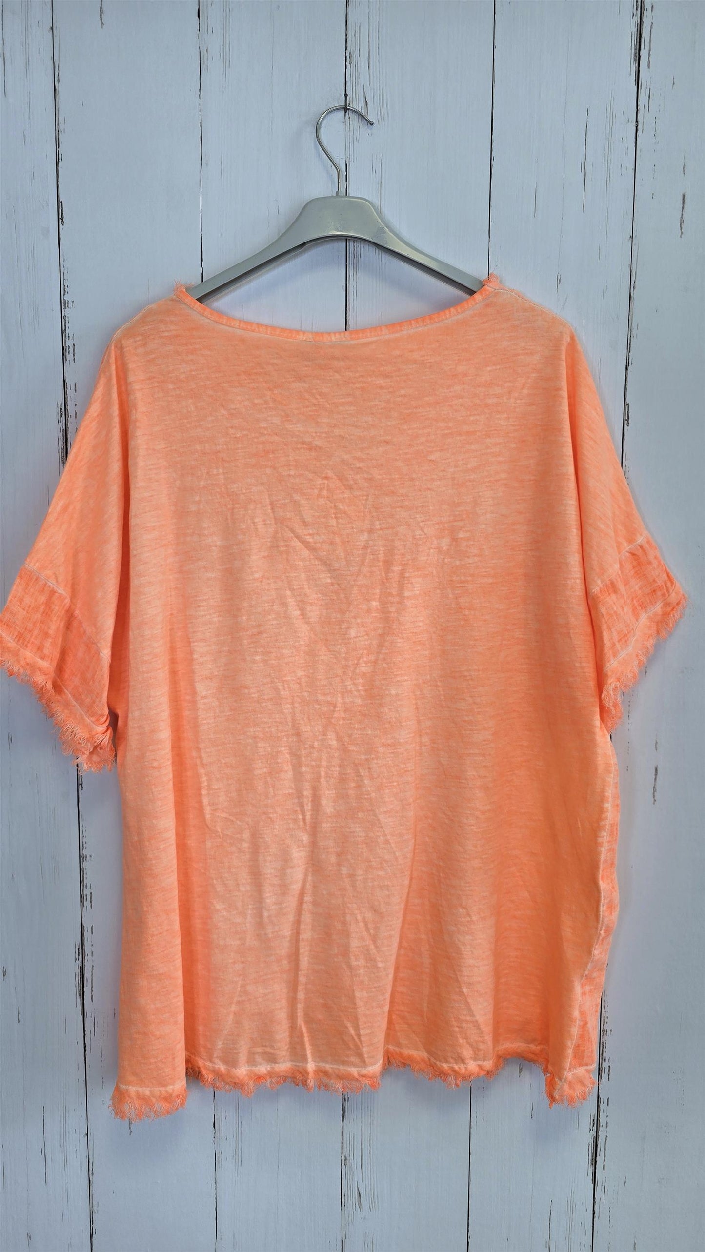 Orange oversized topp med “NICE”