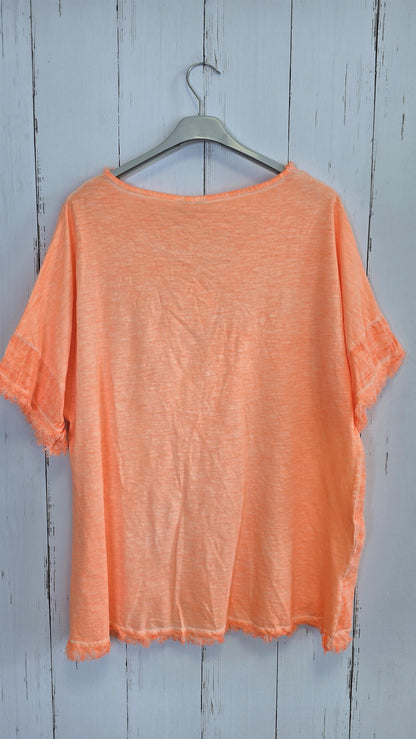 Orange oversized topp med “NICE”