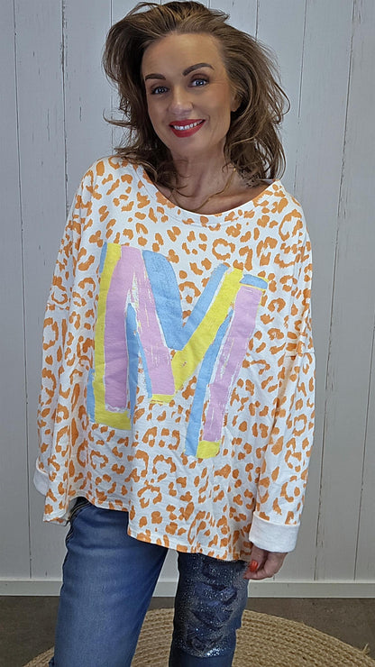 Celine bomullstopp oransje leo