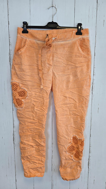 Alma bukse med blomst orange