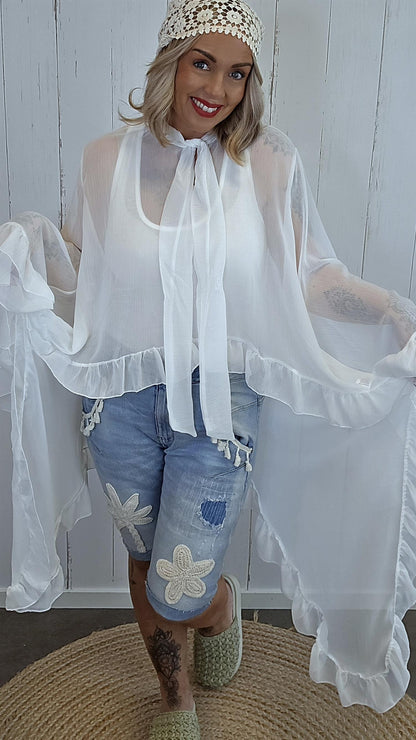 Elegant chiffontopp med volanger hvit