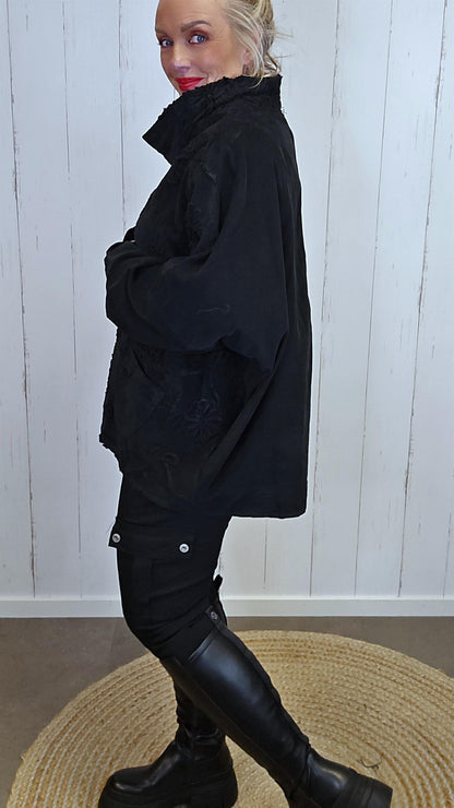 Gia oversized tunikatopp i minikord med broderier