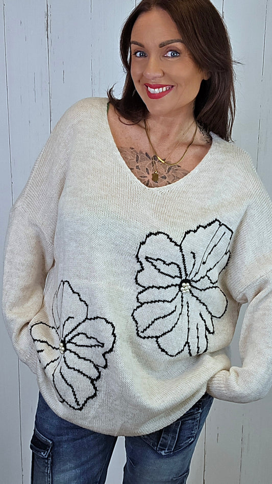 Elise beige blomsterstrikk med perledetaljer