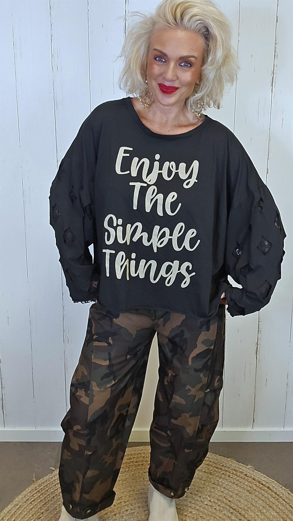 Livia oversized topp med blondeermer svart