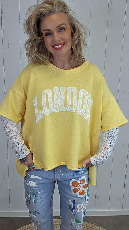 Birka oversized topp mørk gul/hvit