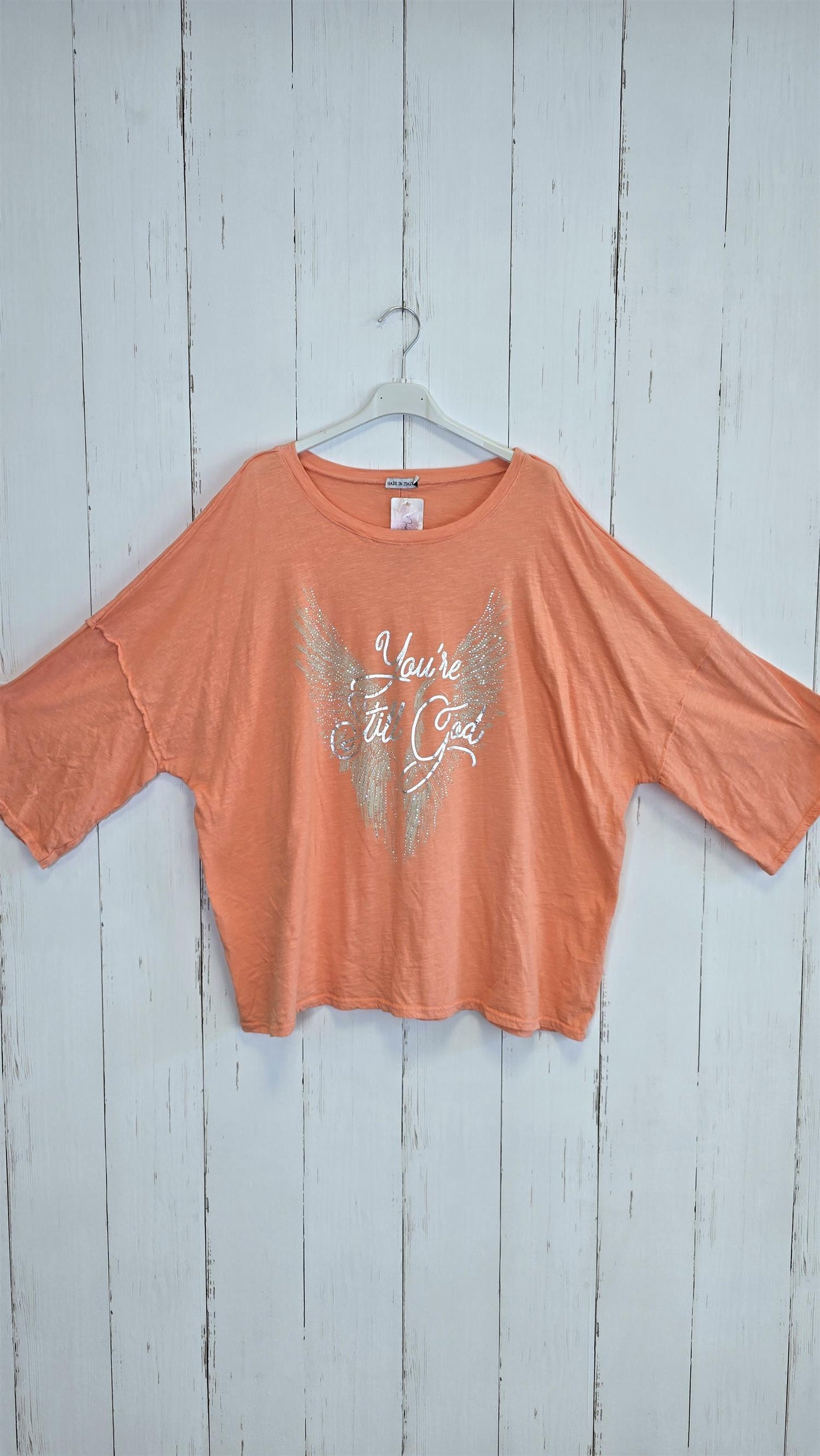 Orangefarget topp med glitterprint