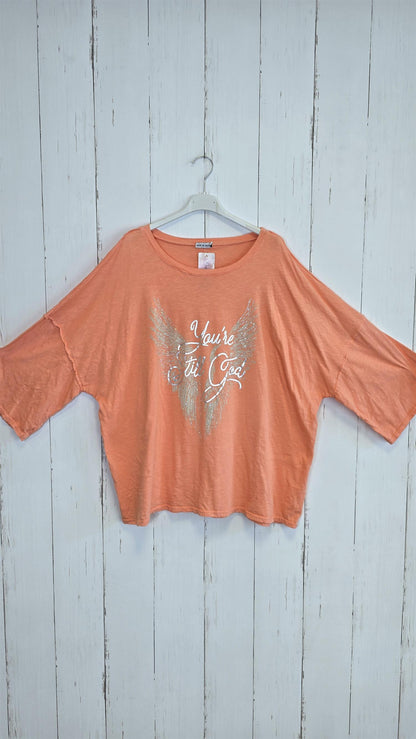 Orangefarget topp med glitterprint