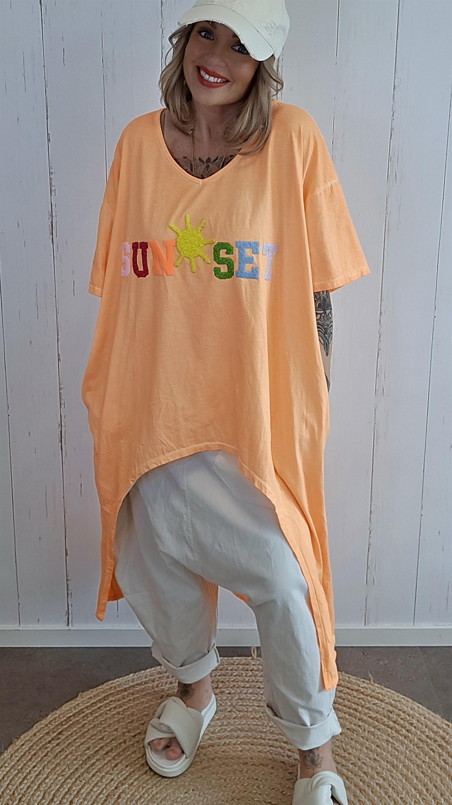 Stine kjole med “Sunset”-print orange